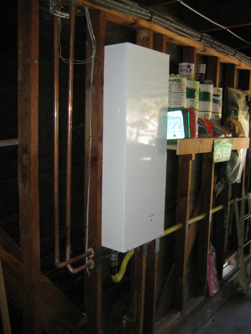 Noritz tankless water heater installation (view of interior cabinet)