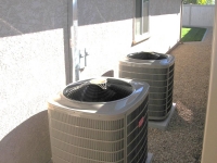 Condenser installation on concrete pads