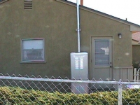 Water heater installation in exterior utility metal shed with venting